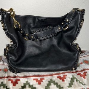 Solid black leather coach bag